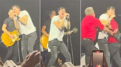 Bryan Adams Ambushed On Stage By Unruly Fan Who Gets Tossed By Security Bryan Adams Ambushed On Stage By Unruly Fan Who Gets Tossed By Security