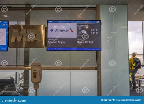 Close Up View Of The Departure Information Board At Miami Airport For American Airlines Flight
