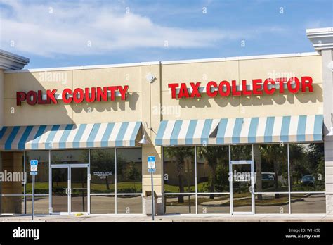 Lake Wales Florida Strip Mall Store Front Polk County Tax Collector Awning Sign Government Agency Office Vertical Glass Reflection Currency Money Fl09 Stock Photo Alamy