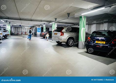 Mother And Son Walking To Luxury Car In Parking Garage Editorial Photography Image Of Interior Mother And Son Walking To Luxury Car In Parking Garage Editorial Photography Image Of Interior