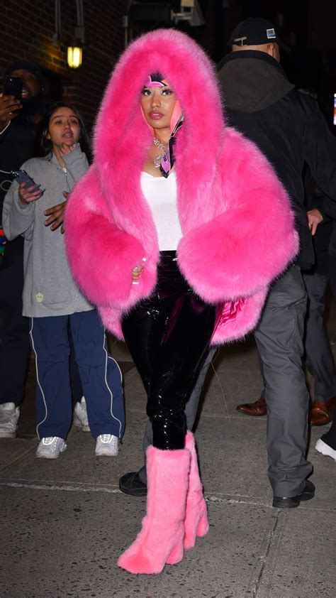Nicki Minaj Pulls Off An Electric Quick Change In Two Neon Fur Coats