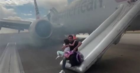 Video Shows Passengers Evacuating American Airlines Plane Video Shows Passengers Evacuating American Airlines Plane